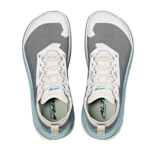 Altra Men's Olympus 275 HiLo top view showing a gray upper with white highlights and white laces on a white tongue with visible light blue sole around the edge of the shoes.