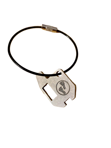 GrizzKey Bear Can Opener compatible with BearVault, Garcia, and Bearikade with a wire loop on a white background