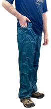 LightHeart Gear ultralight rain pants showing a false pocket at the the top