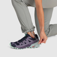 Close up view of the pant drawstring on the bottom cuff of the Outdoor Research Women's Ferrosi Hiking Pants in light gray